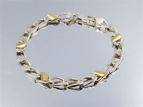 owe their precious metal shades to the use of pure silver and 18k gold. . Gold and silver italy